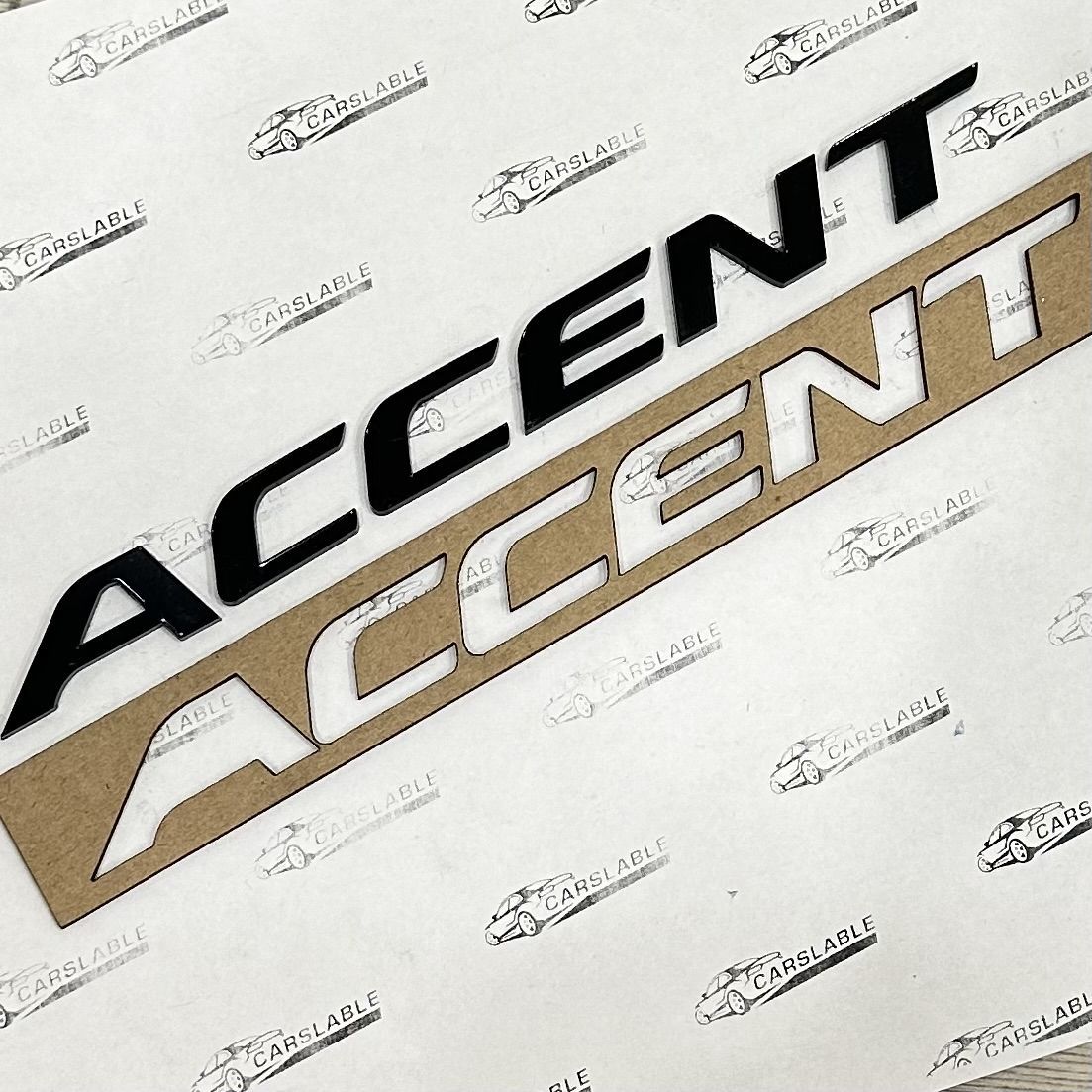 Шильдик Accent