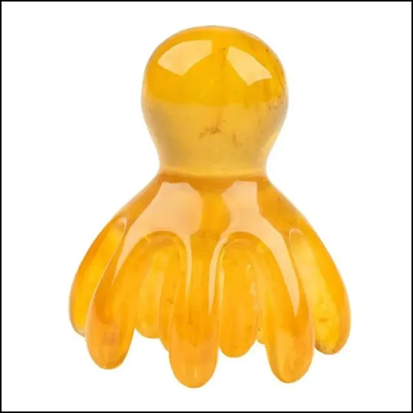 Массажная расческа Big octopus коричневого цвета, оснащенная 14 зубьями, применяемая для меридионального массажа головы, представлена в единственном экземпляре как качественный инструмент.